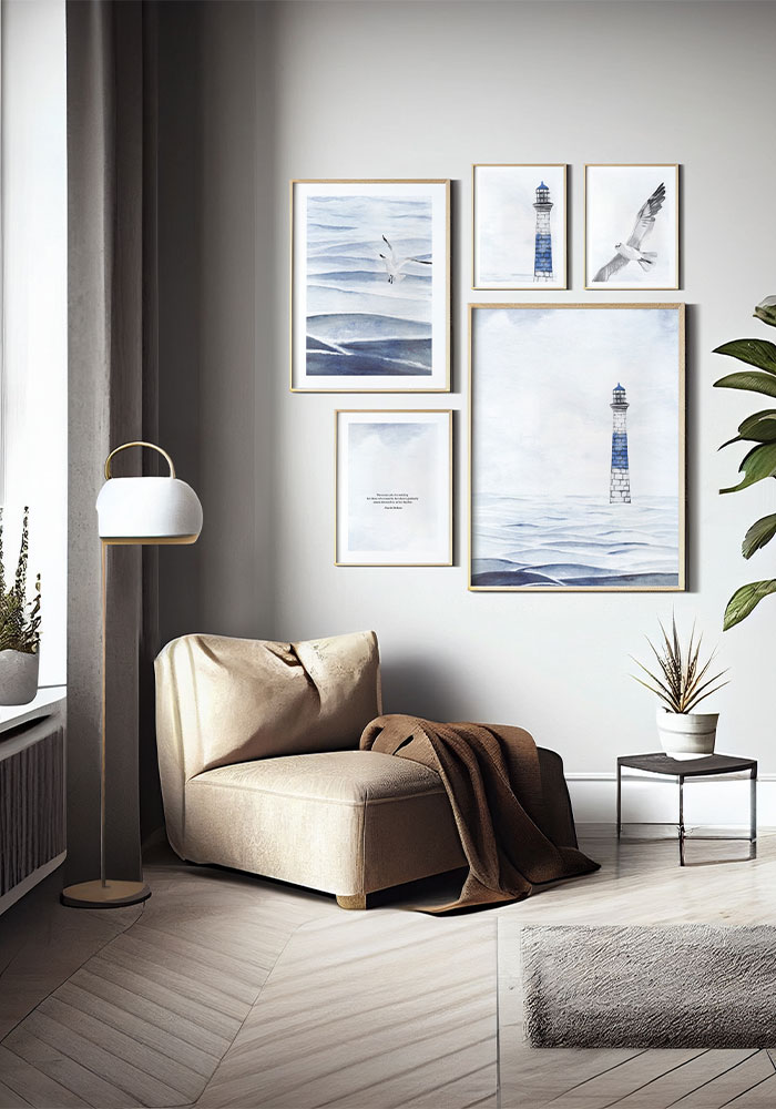 The loneliness of the lighthouse Wall collage of pastel coastal art prints in an elegant interior – Artinforms.store