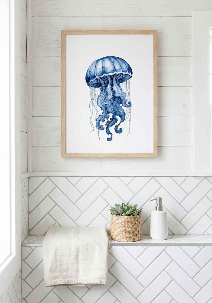 Delicate monochromatic watercolor illustration of a dzwon-shaped jellyfish with trailing tentacles in deep indigo blue, on a plain white background.