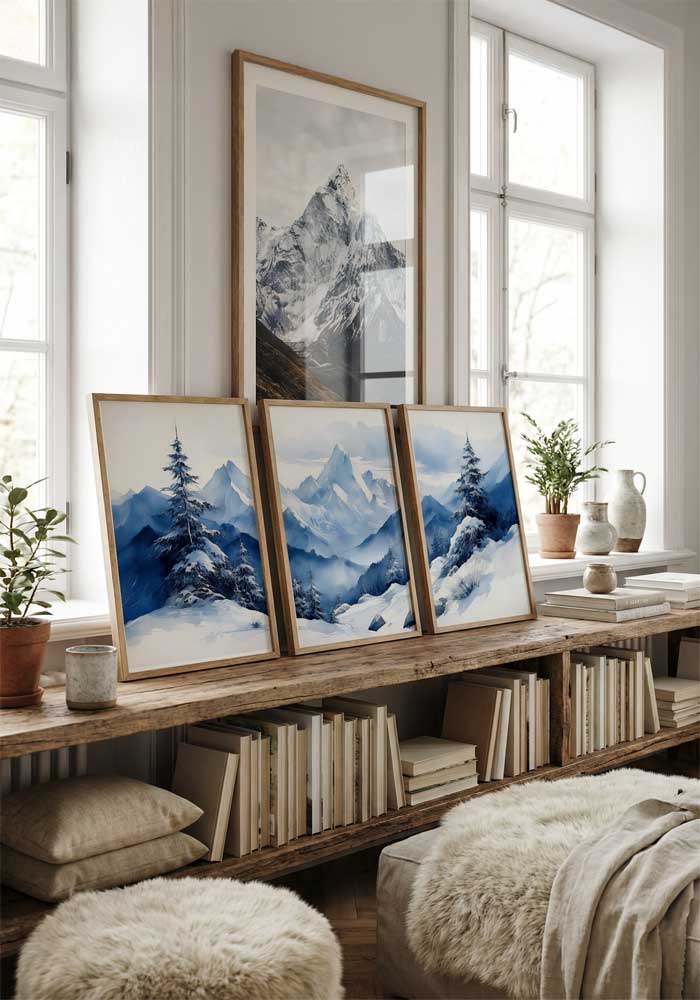 Panoramic watercolor triptych of blue misty mountains and snow-covered pine trees in a wide winter landscape.